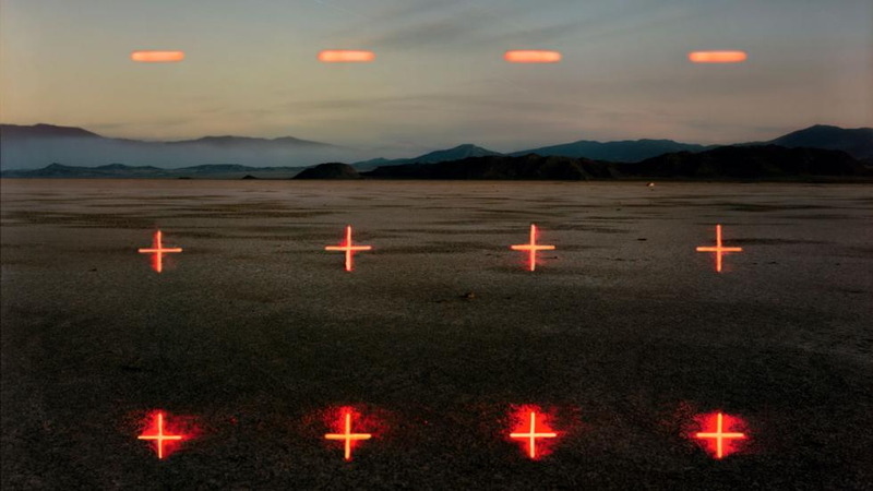Illustration for article titled What Is The Meaning Of These Strange Glowing Shapes In The Wilderness?